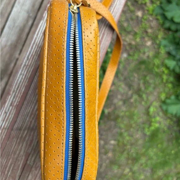 Blair Ritchey Ginger Ber Perforated Crossbody Bag with bright blue zipper. - Picture 2 of 7